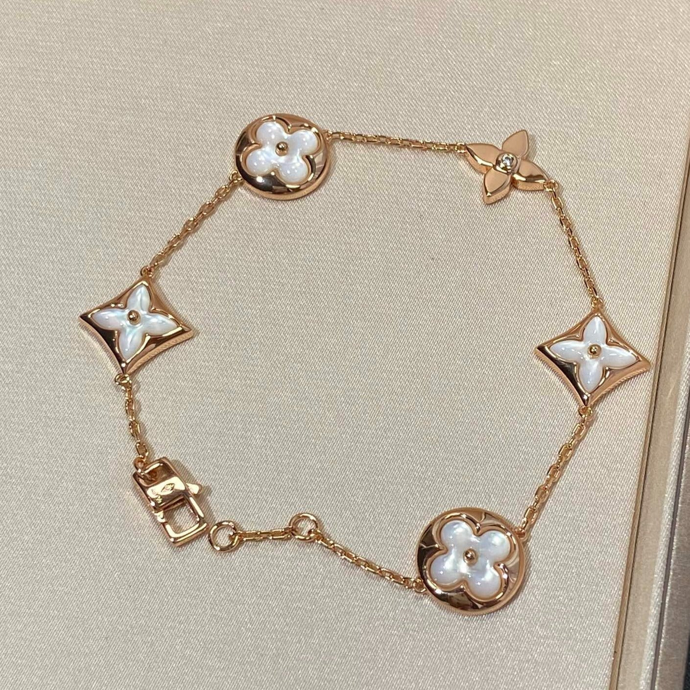 [LORA]STAR AND SUN 5 MOTIF MOP PINK GOLD BRACELET