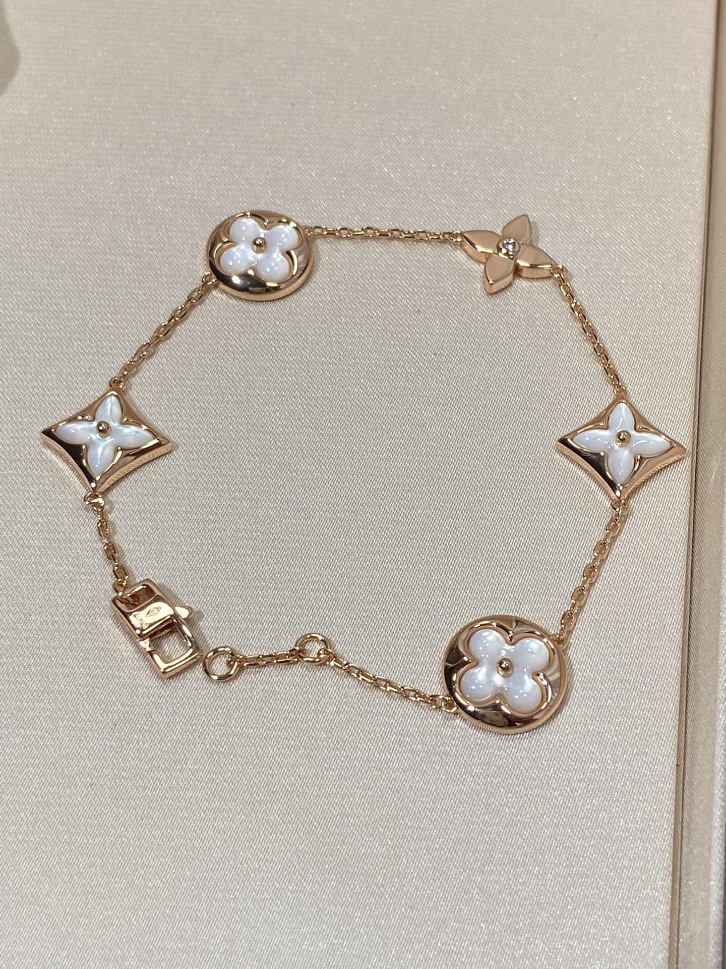 [LORA]STAR AND SUN 5 MOTIF MOP PINK GOLD BRACELET